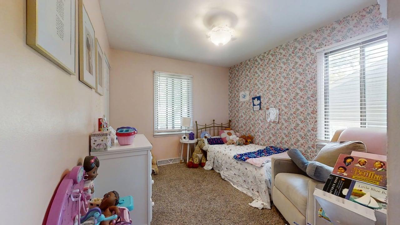 2605 Trafalgar Square Champaign, IL 61821 - Photo 18 of 42 a bedroom with furniture and a window