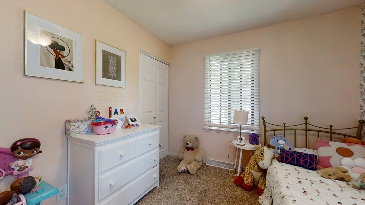 2605 Trafalgar Square Champaign, IL 61821 - Photo 20 of 42 a bedroom with a bed and a window