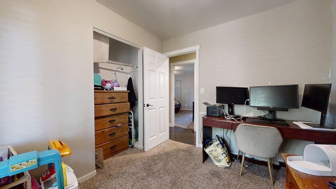 2605 Trafalgar Square Champaign, IL 61821 - Photo 22 of 42 a view of a livingroom with workspace and a couch