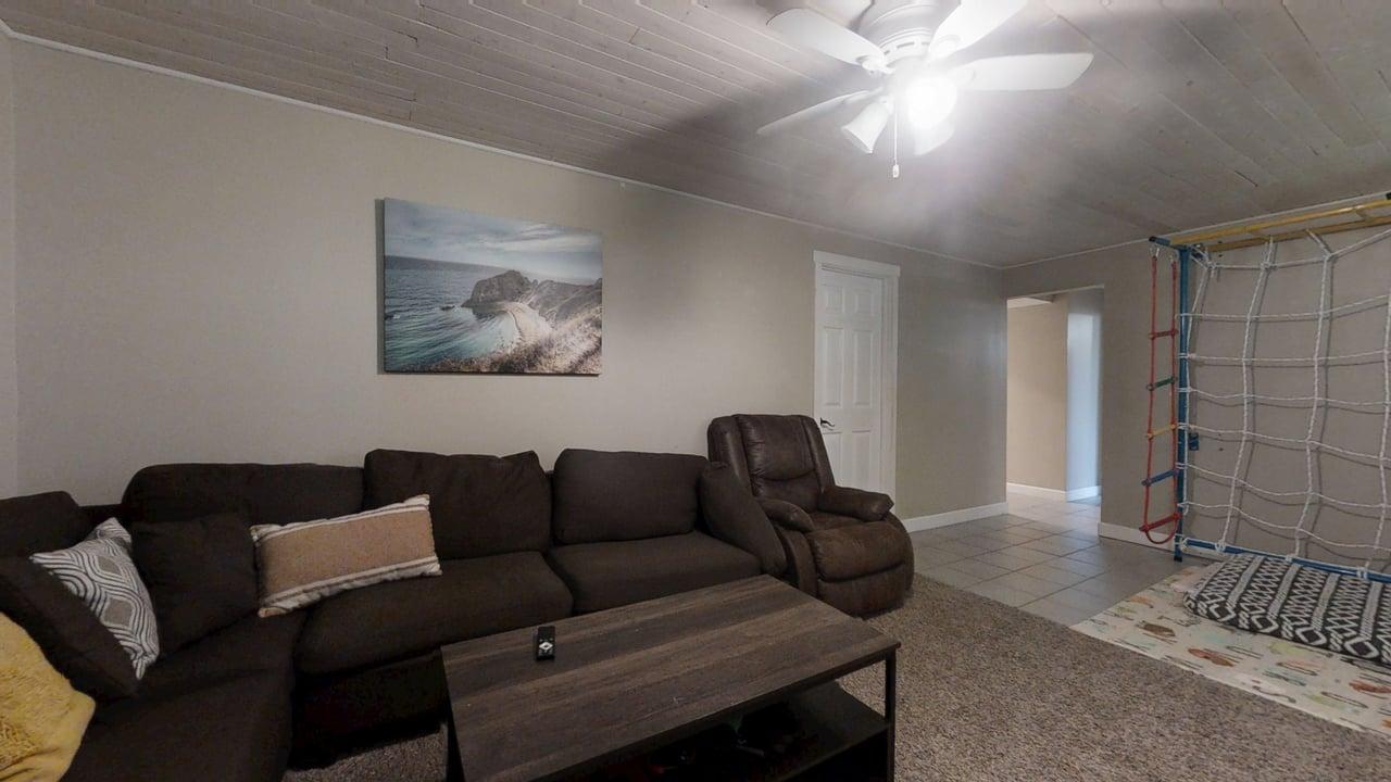 2605 Trafalgar Square Champaign, IL 61821 - Photo 27 of 42 a living room with furniture and a rug