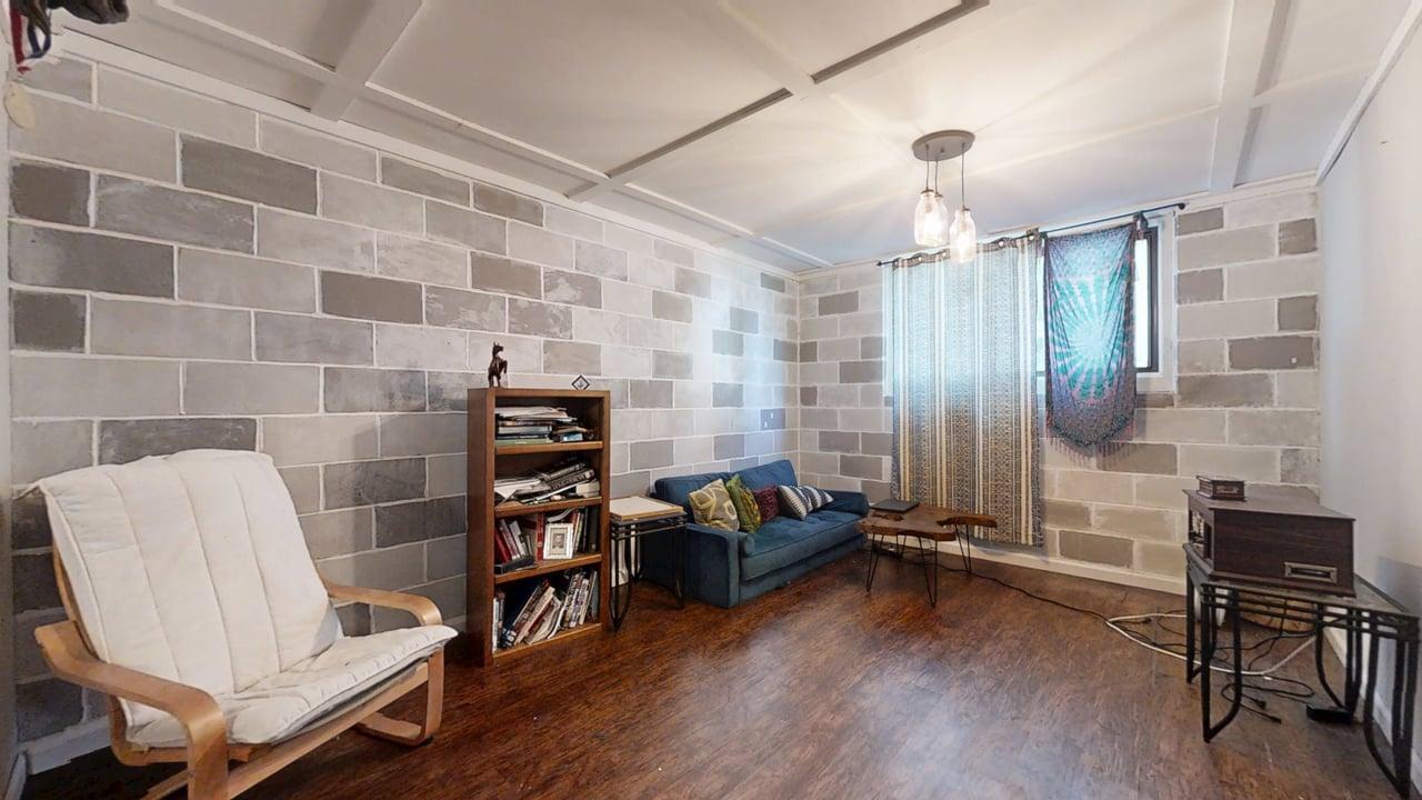 2605 Trafalgar Square Champaign, IL 61821 - Photo 31 of 42 a view of a workspace with furniture and wooden floor