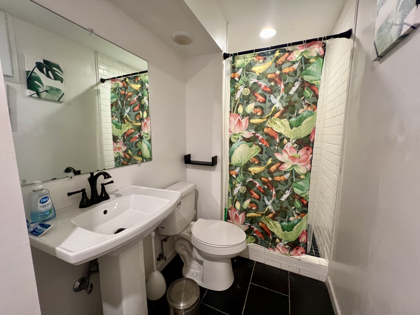 2605 Trafalgar Square Champaign, IL 61821 - Photo 34 of 42 a bathroom with a sink a toilet and shower curtain