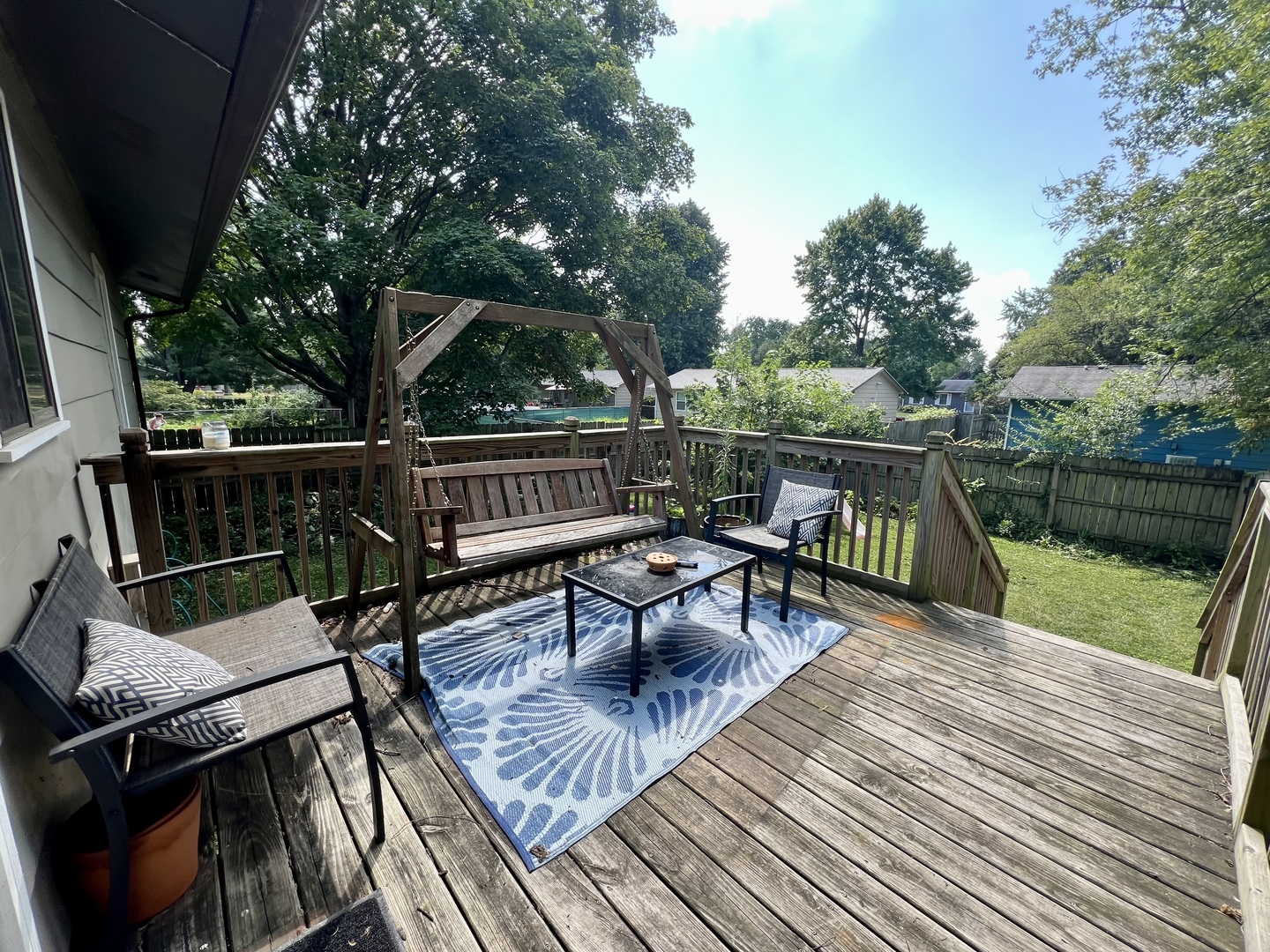 2605 Trafalgar Square Champaign, IL 61821 - Photo 35 of 42 a view of a roof deck with couches and wooden floor