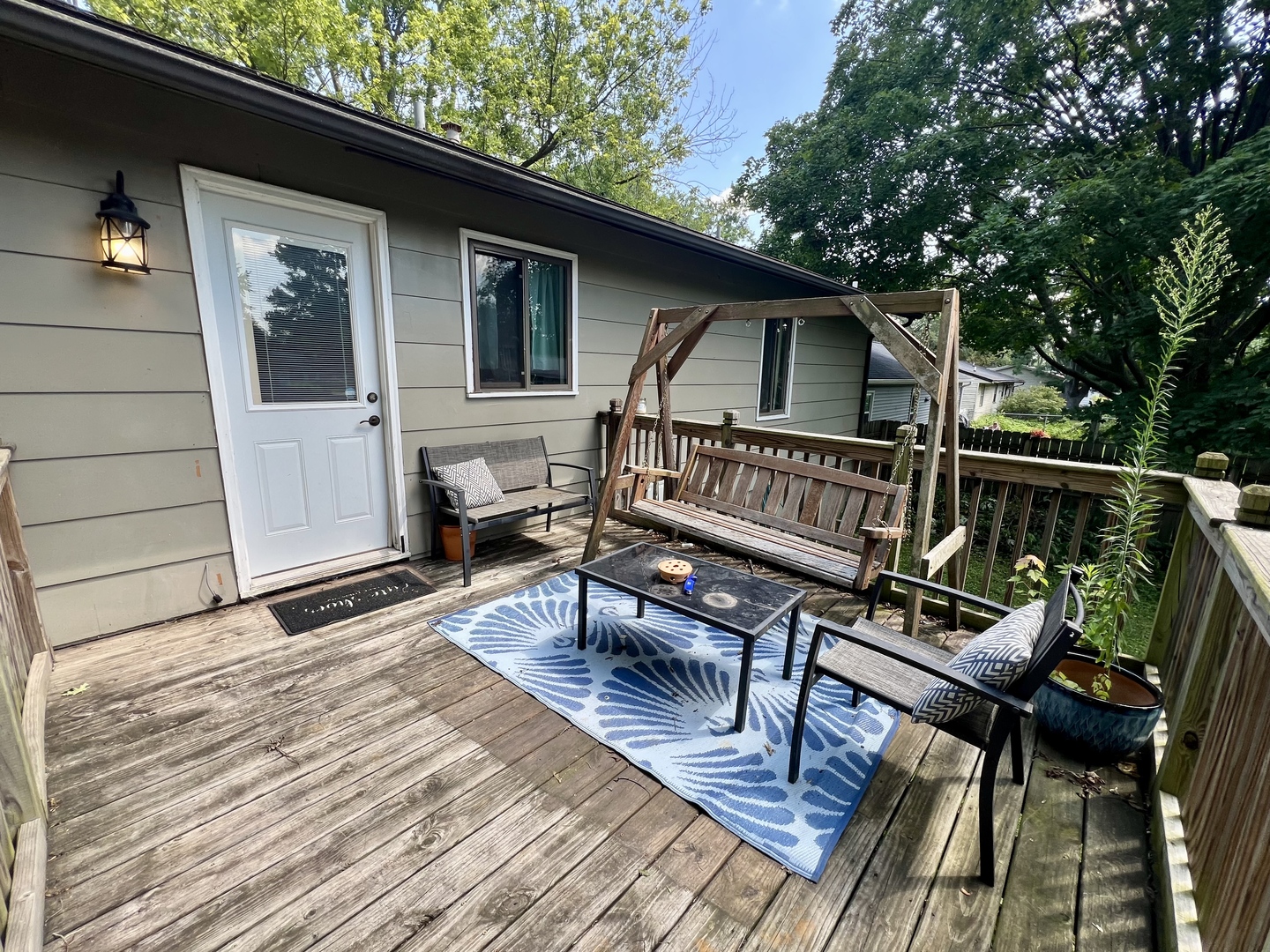 2605 Trafalgar Square Champaign, IL 61821 - Photo 36 of 42 a roof deck with a table and chairs