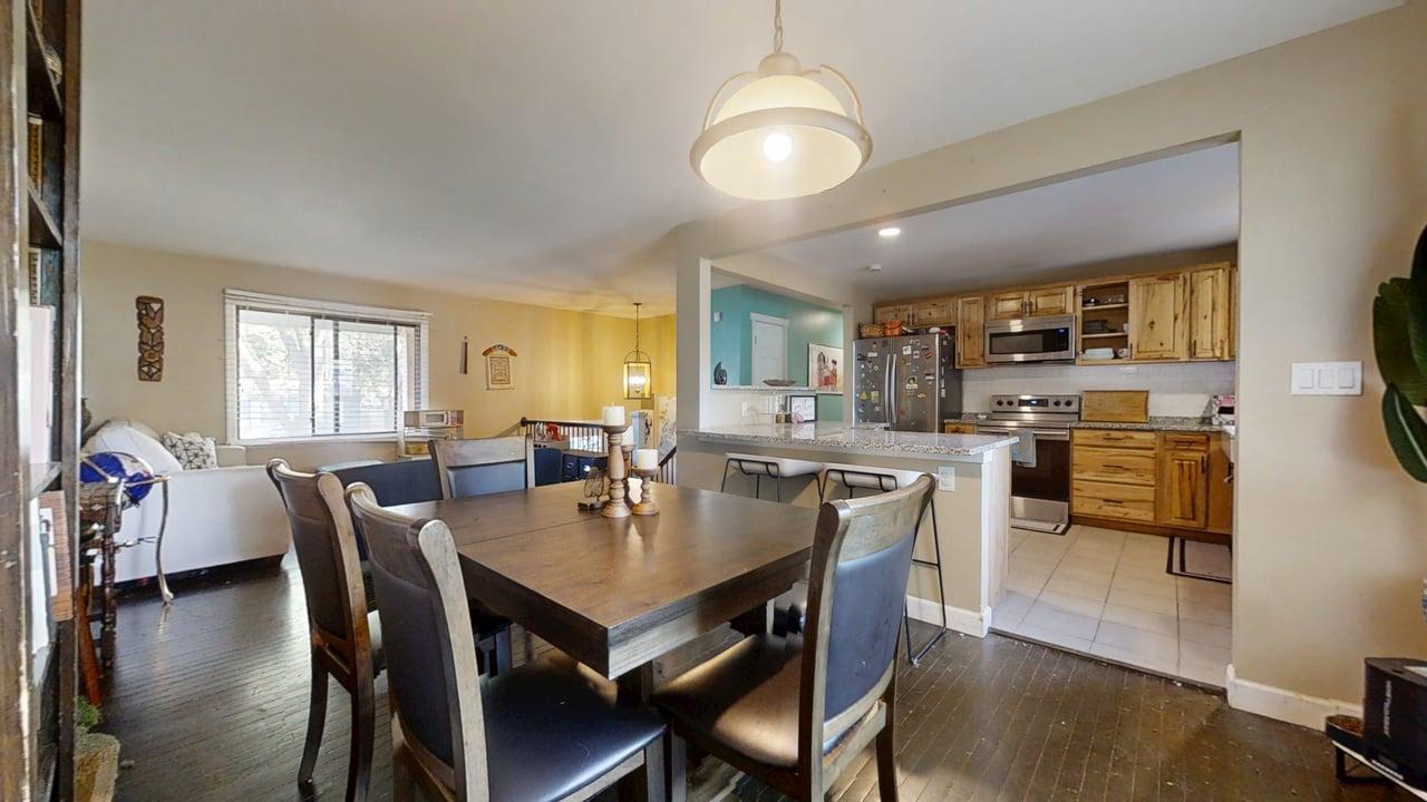2605 Trafalgar Square Champaign, IL 61821 - Photo 9 of 42 a view of a dining room with furniture and wooden floor