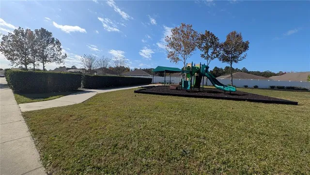 a view of a fence in a yard