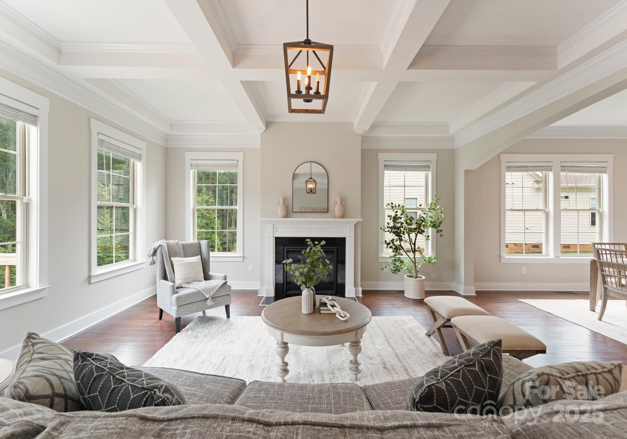 676 Kenway Loop Mooresville, NC 28117 - Photo 13 of 40 a living room with furniture and a fireplace