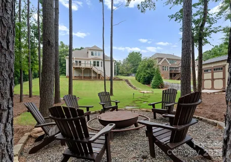 a view of a outdoor sitting area with furniture and garden