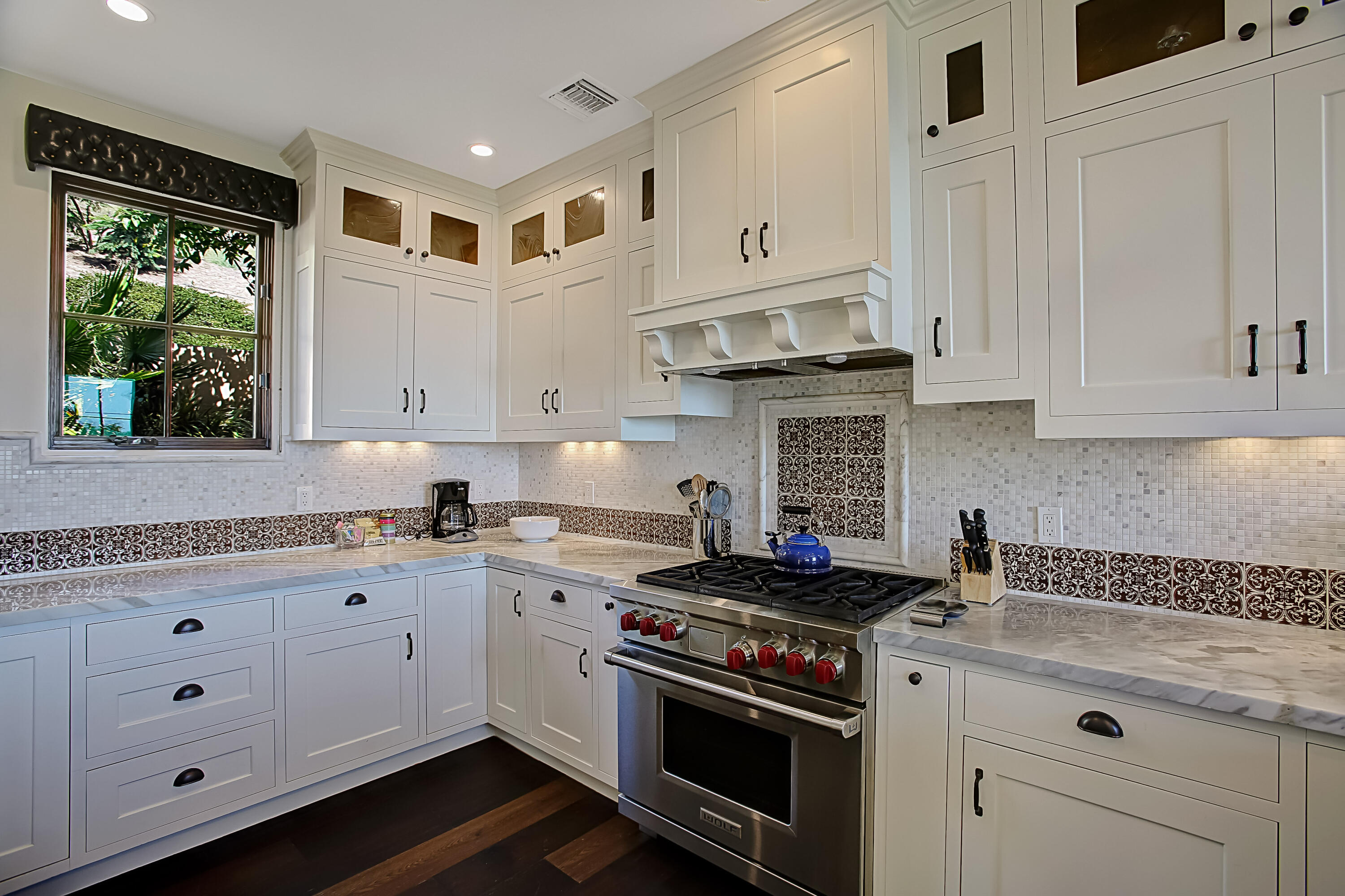 Undisclosed Address Santa Barbara, CA 93109 - Photo 20 of 38 a kitchen with cabinets appliances a sink and a window