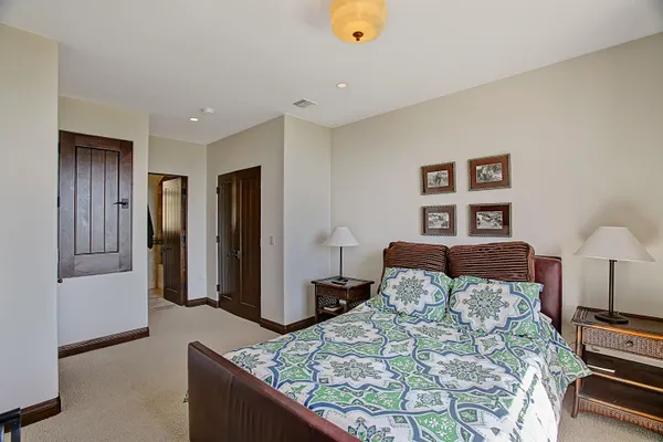 a bathroom with 2 sink double vanity and a mirror
