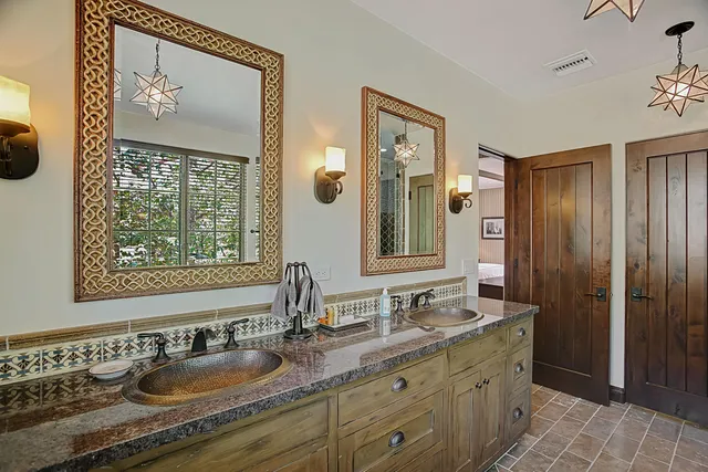 a bathroom with a tub and a shower
