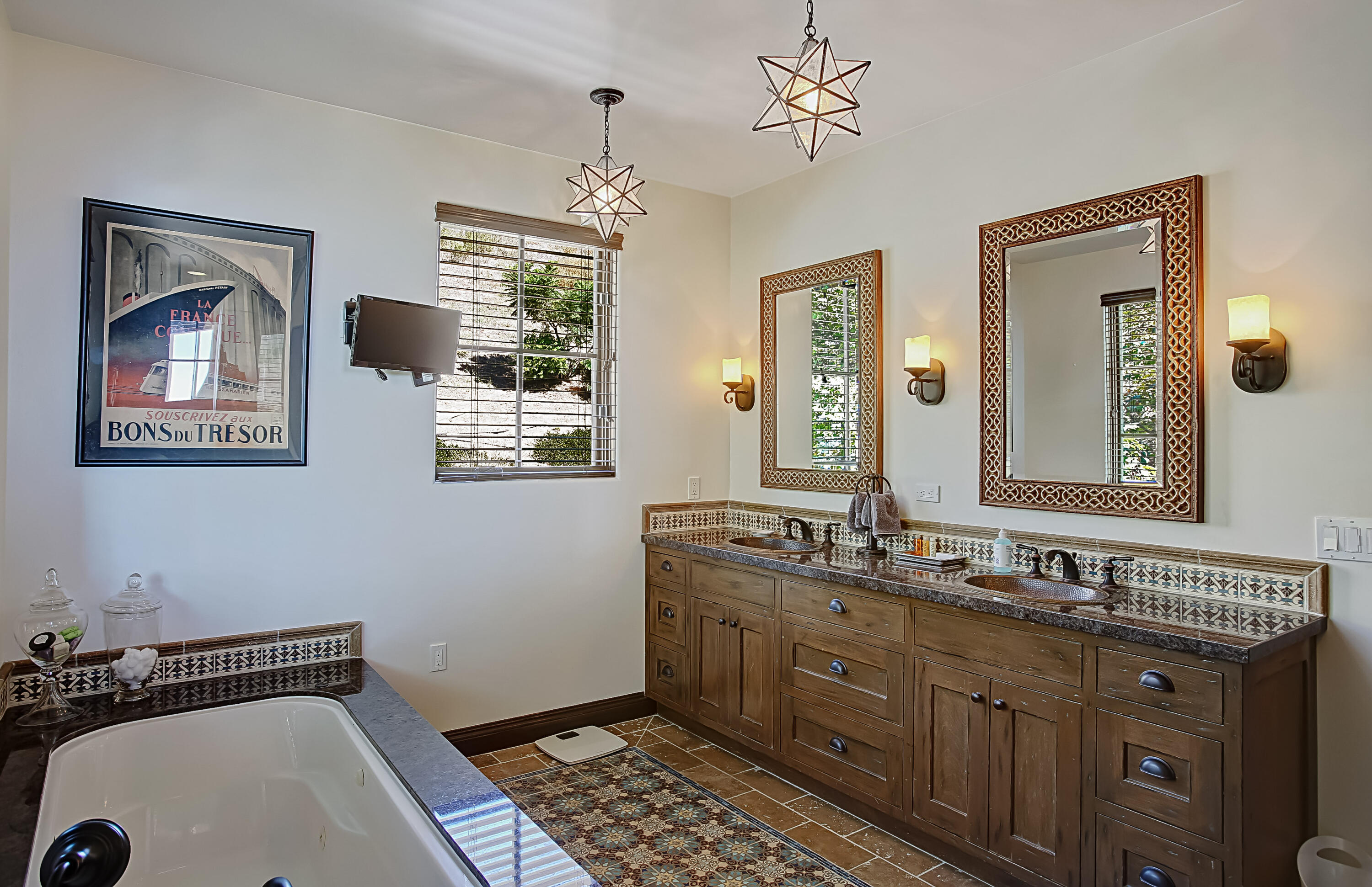 Undisclosed Address Santa Barbara, CA 93109 - Photo 33 of 38 a bathroom with a sink and a mirror