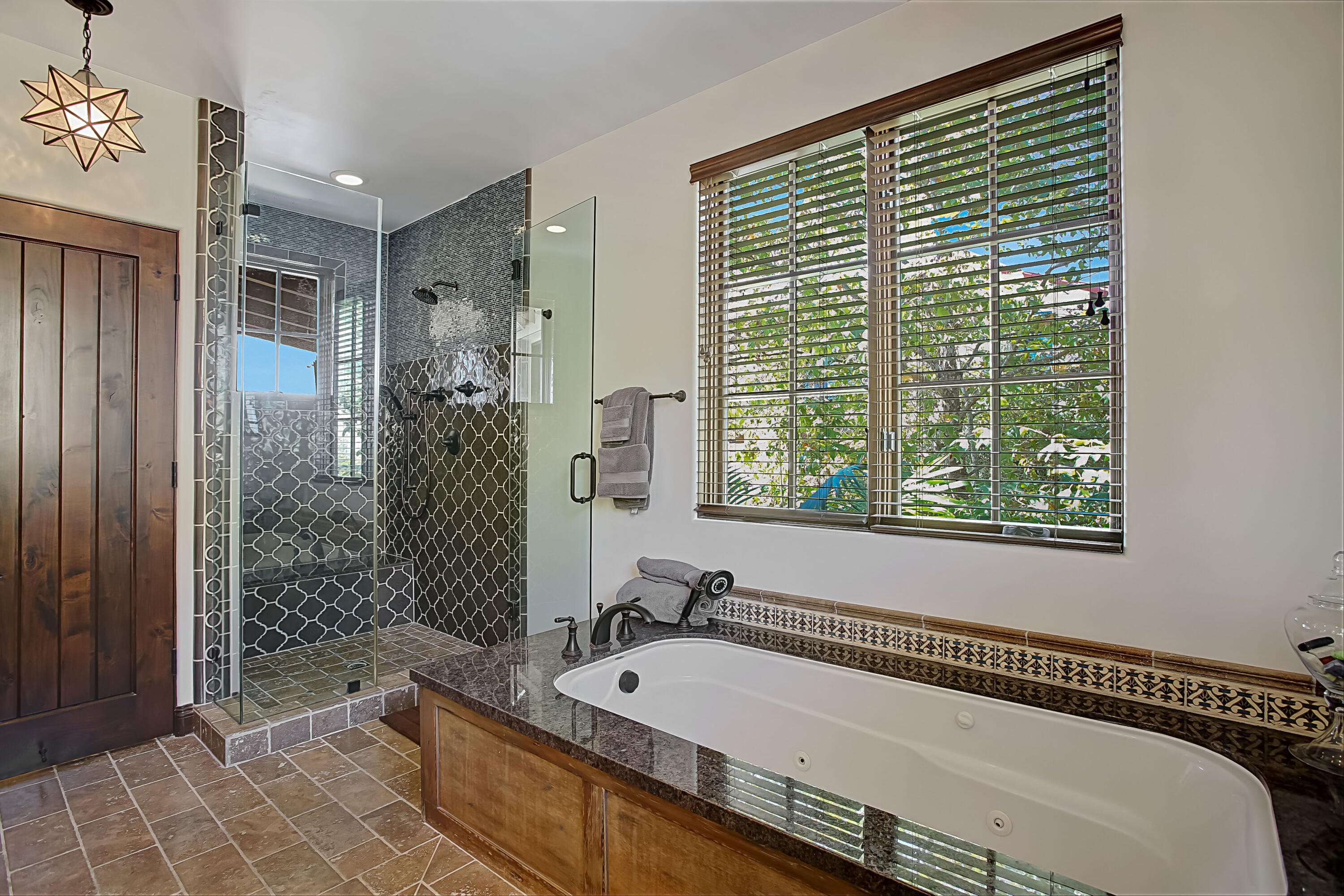 Undisclosed Address Santa Barbara, CA 93109 - Photo 34 of 38 a bathroom with a tub and a shower