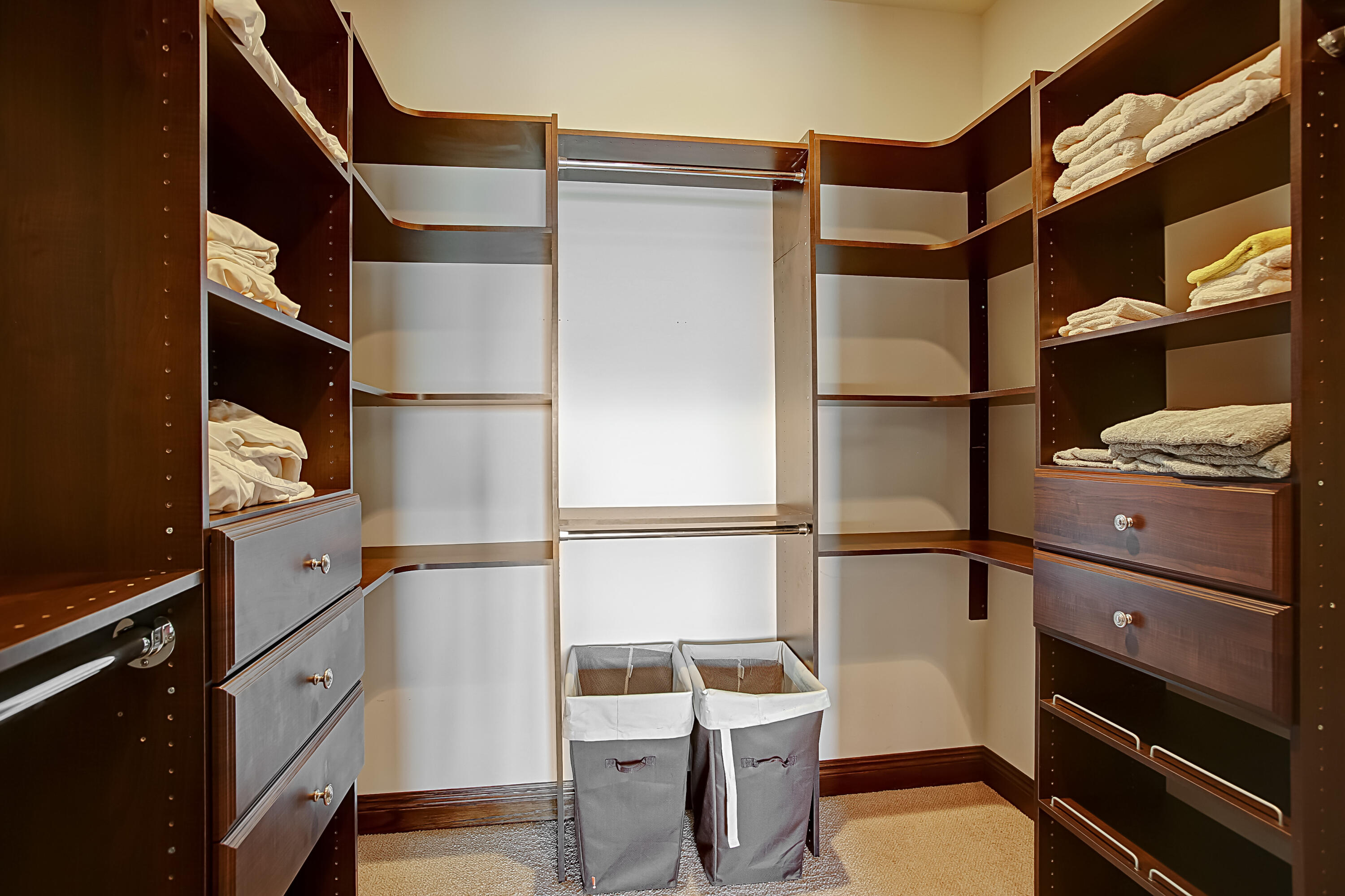 Undisclosed Address Santa Barbara, CA 93109 - Photo 35 of 38 a view of walk in closet with clothes and shoes