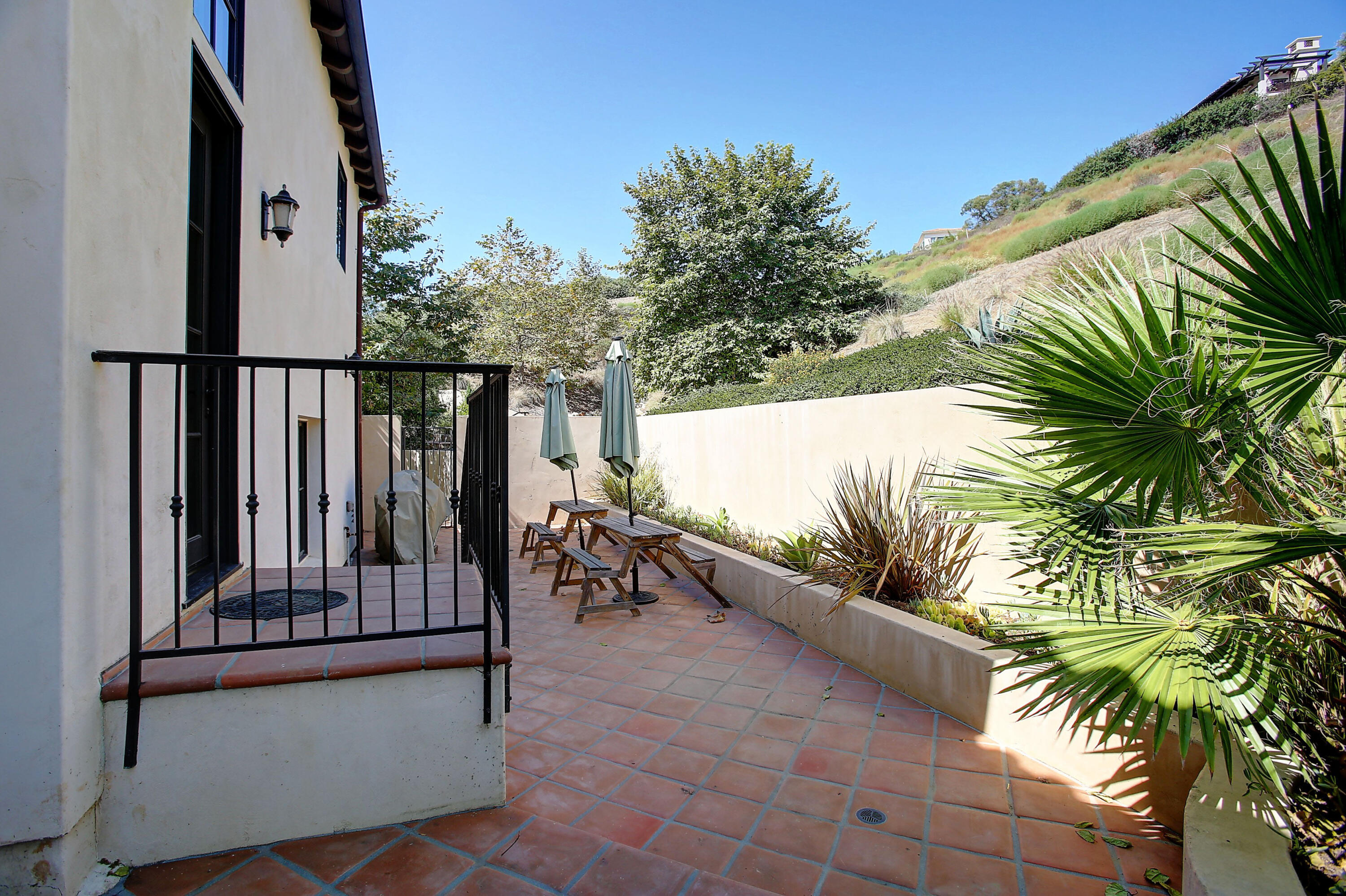 Undisclosed Address Santa Barbara, CA 93109 - Photo 9 of 38 a view of balcony with a potted plant and outdoor seating