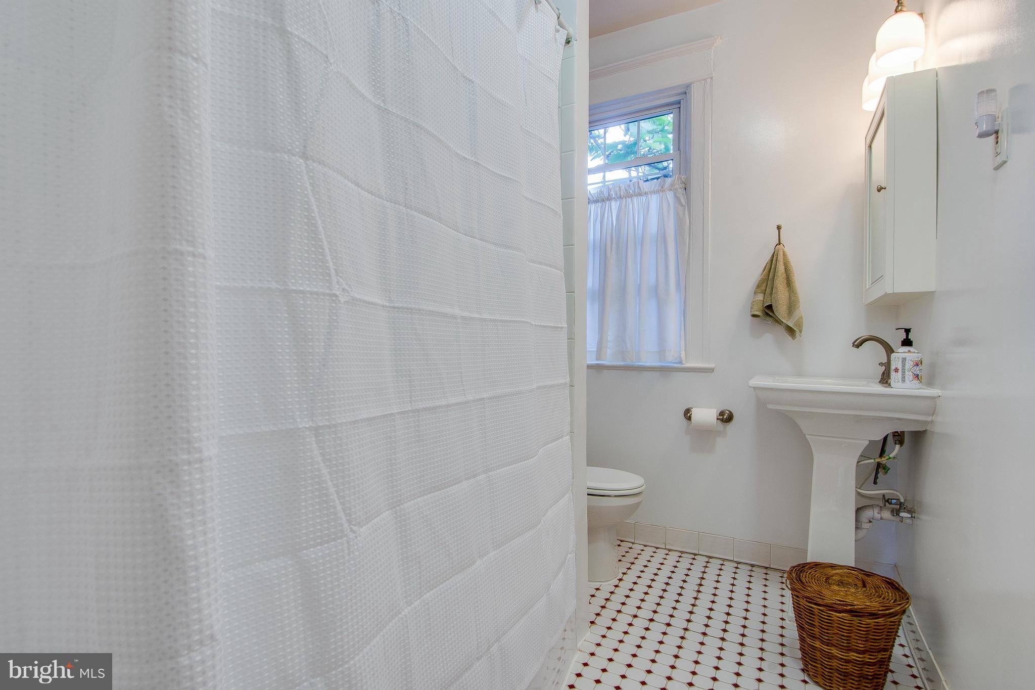 703 E Street Northeast Washington, DC 20002 - Photo 22 of 30 Upper level full bathroom.