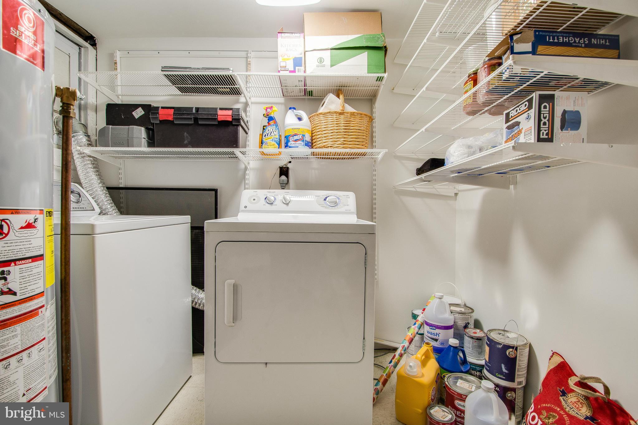 703 E Street Northeast Washington, DC 20002 - Photo 27 of 30 Lower level laundry with space for storage.