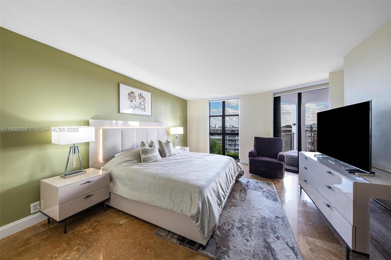 4000 Towerside Terrace, Unit 604 Miami, FL 33138 - Photo 20 of 79 a bedroom with a bed and a flat screen tv