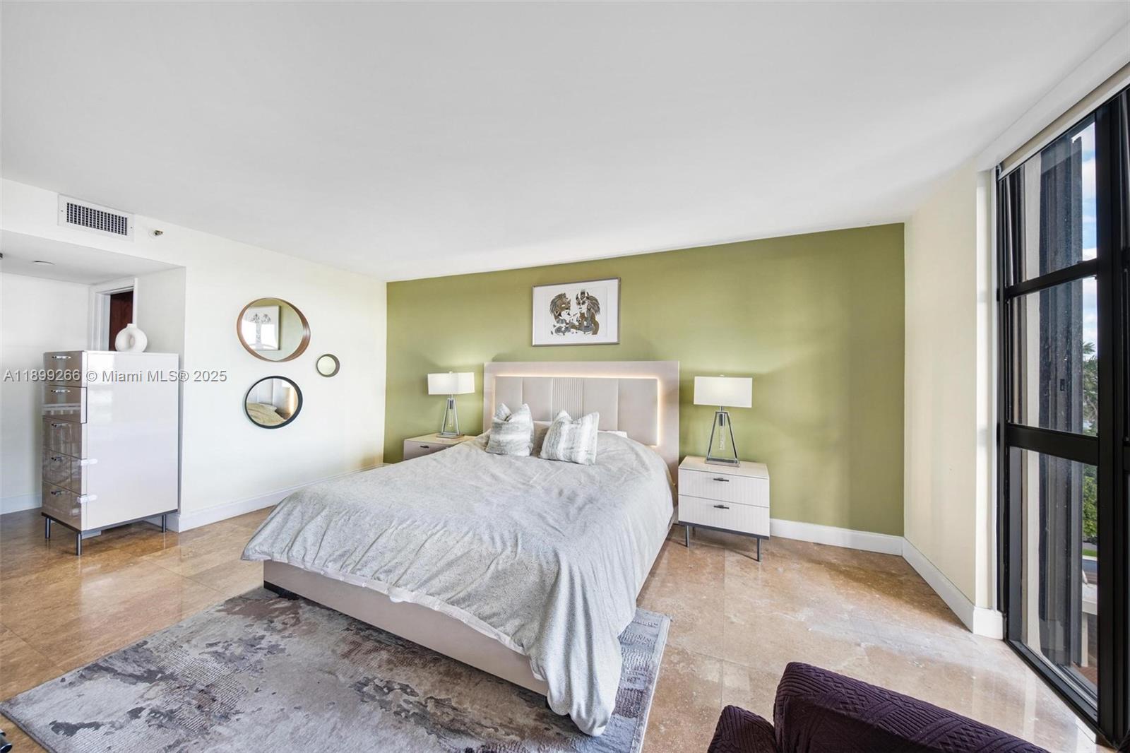 4000 Towerside Terrace, Unit 604 Miami, FL 33138 - Photo 22 of 79 a bedroom with a bed and a wall painting