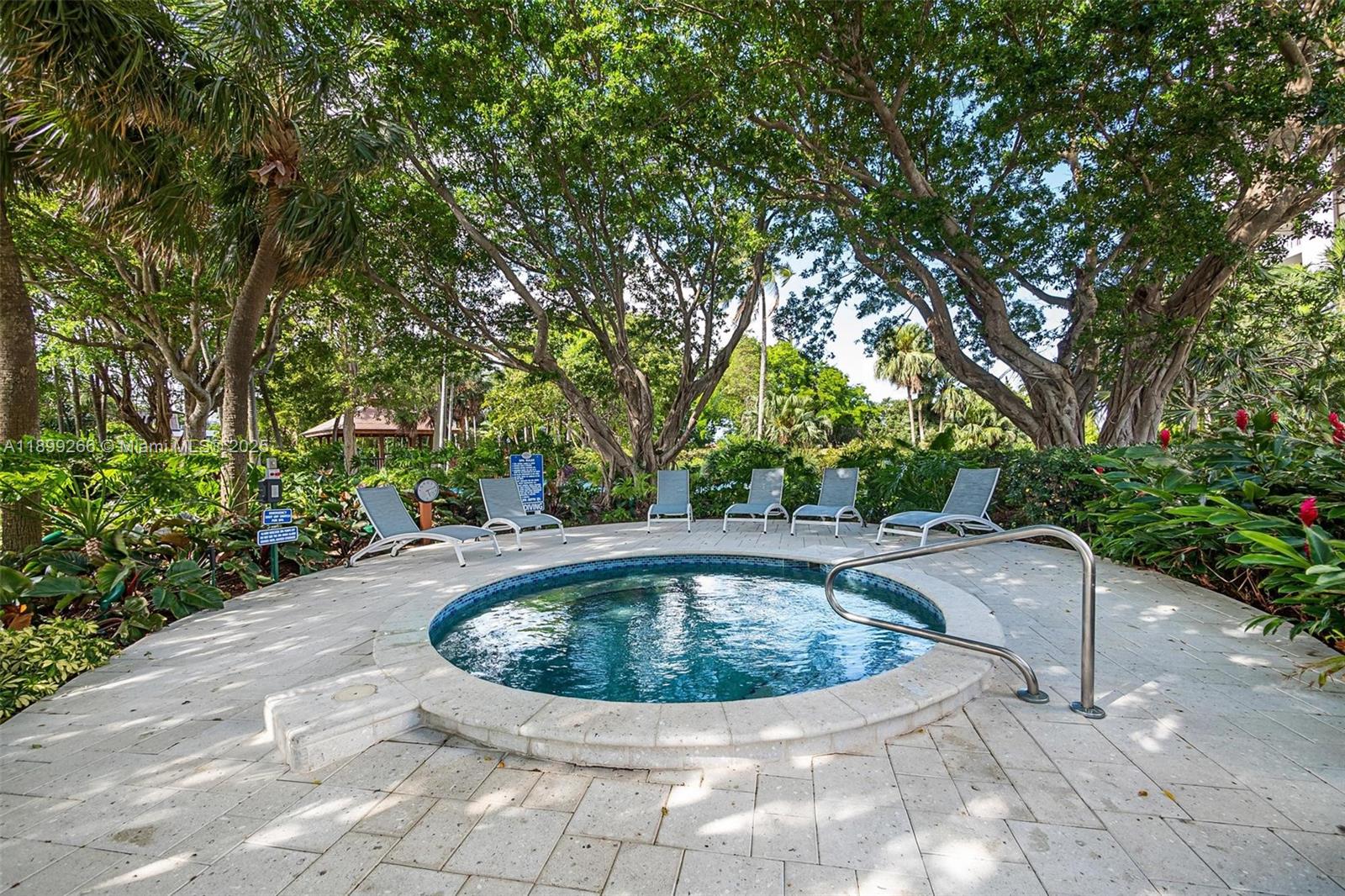 4000 Towerside Terrace, Unit 604 Miami, FL 33138 - Photo 27 of 79 a view of a swimming pool with back yard