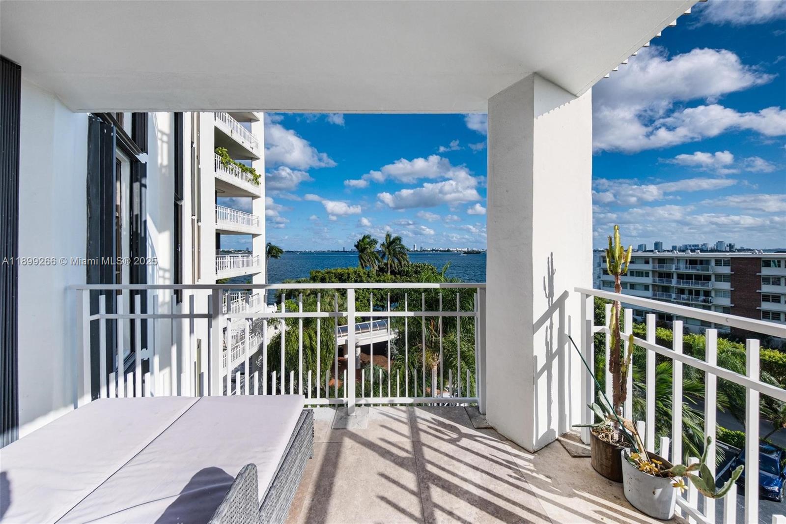 4000 Towerside Terrace, Unit 604 Miami, FL 33138 - Photo 6 of 79 a view of a balcony with wooden floor