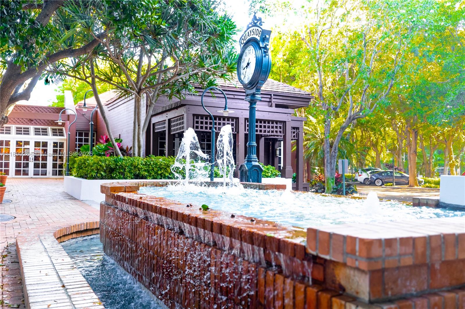 4000 Towerside Terrace, Unit 604 Miami, FL 33138 - Photo 71 of 79 a view of a house with a tree and wooden fence