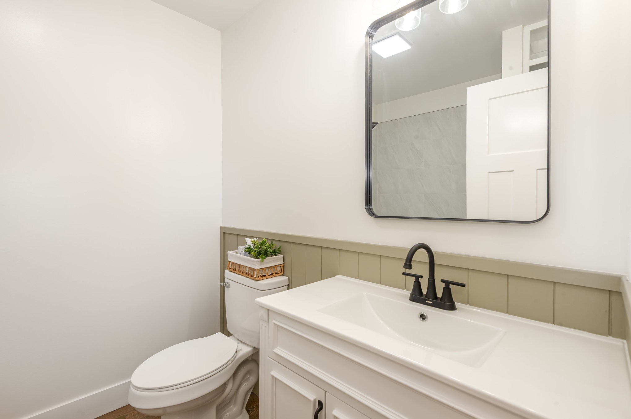 231 South Palmers Chapel Road White House, TN 37188 - Photo 15 of 40 a bathroom with a toilet a sink and mirror