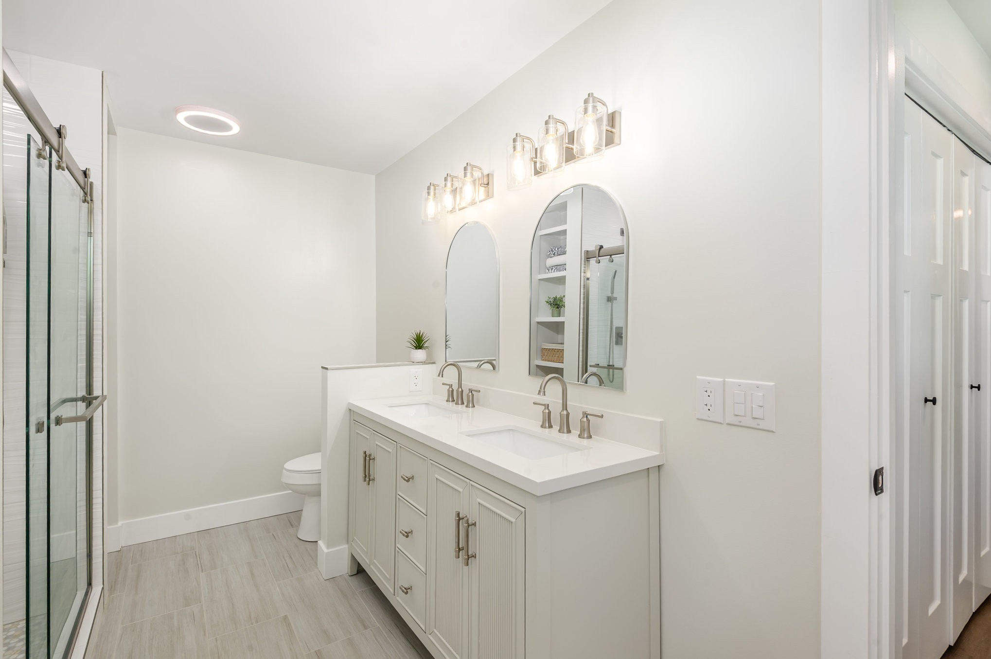231 South Palmers Chapel Road White House, TN 37188 - Photo 21 of 40 a bathroom with a double vanity sink mirror and toilet