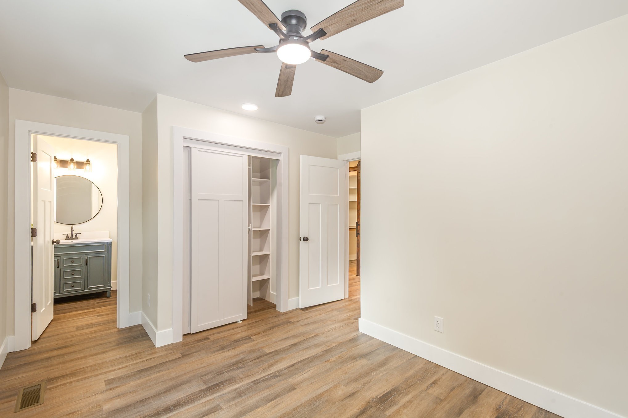 231 South Palmers Chapel Road White House, TN 37188 - Photo 22 of 40 a view of a hallway with wooden floor and closet