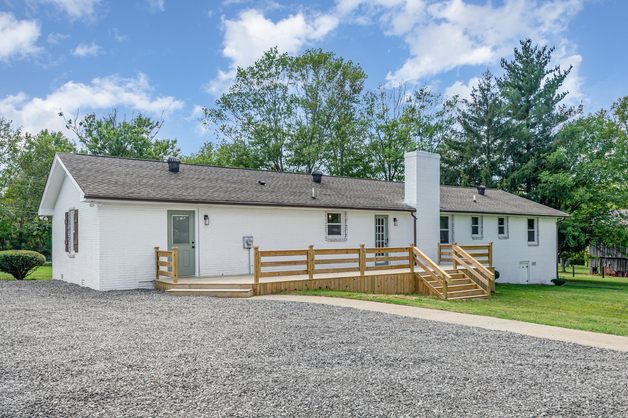 231 South Palmers Chapel Road White House, TN 37188 - Photo 27 of 40 a front view of a house with a yard and garage