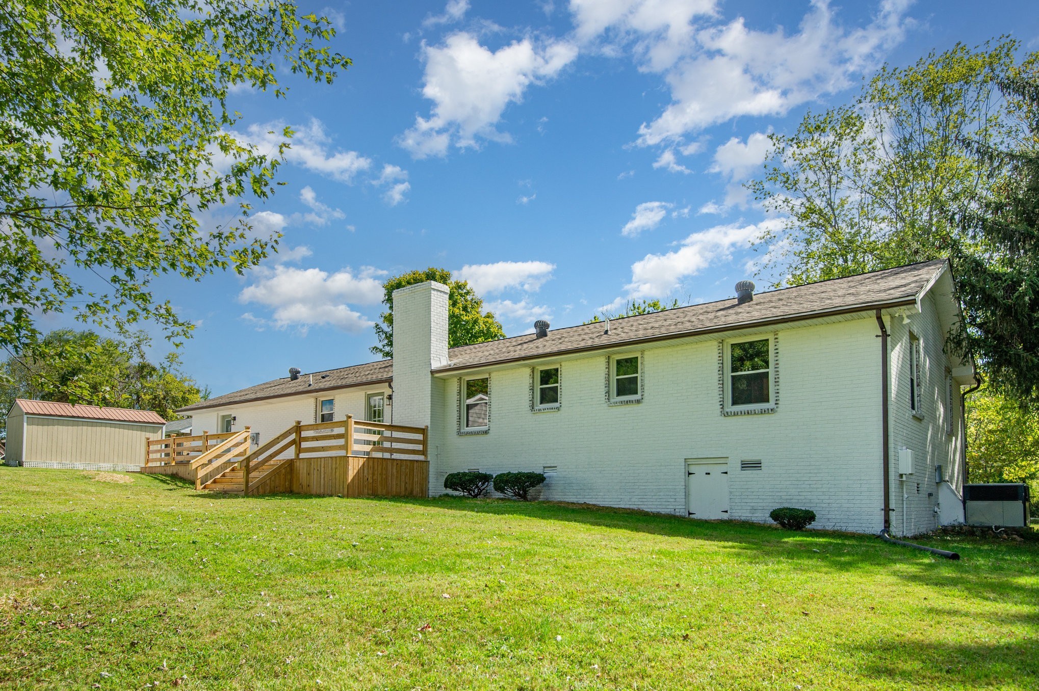 231 South Palmers Chapel Road White House, TN 37188 - Photo 30 of 40 a view of a backyard with potted plants and large tree