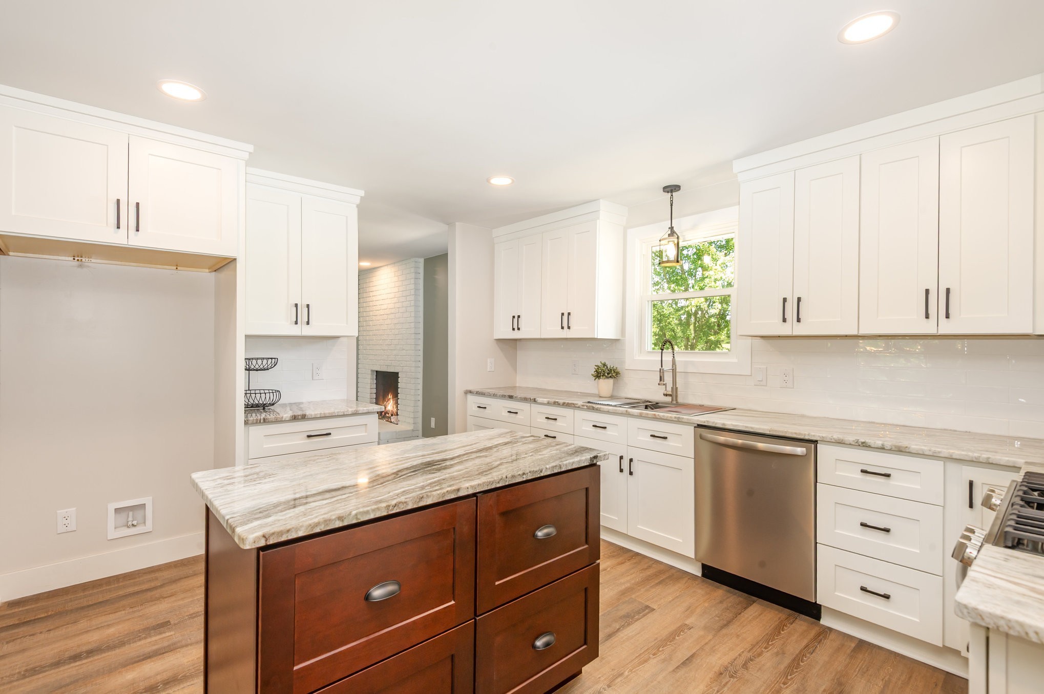 231 South Palmers Chapel Road White House, TN 37188 - Photo 10 of 40 a kitchen with a sink stove and cabinets