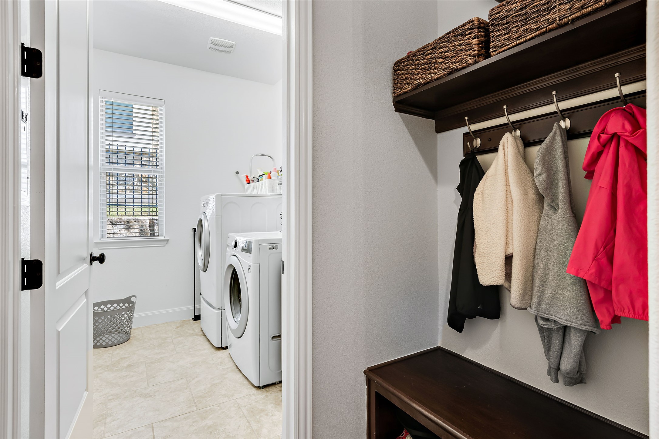 106 Maxwell Way Austin, TX 78738 - Photo 22 of 40 Laundry area with tile flooring