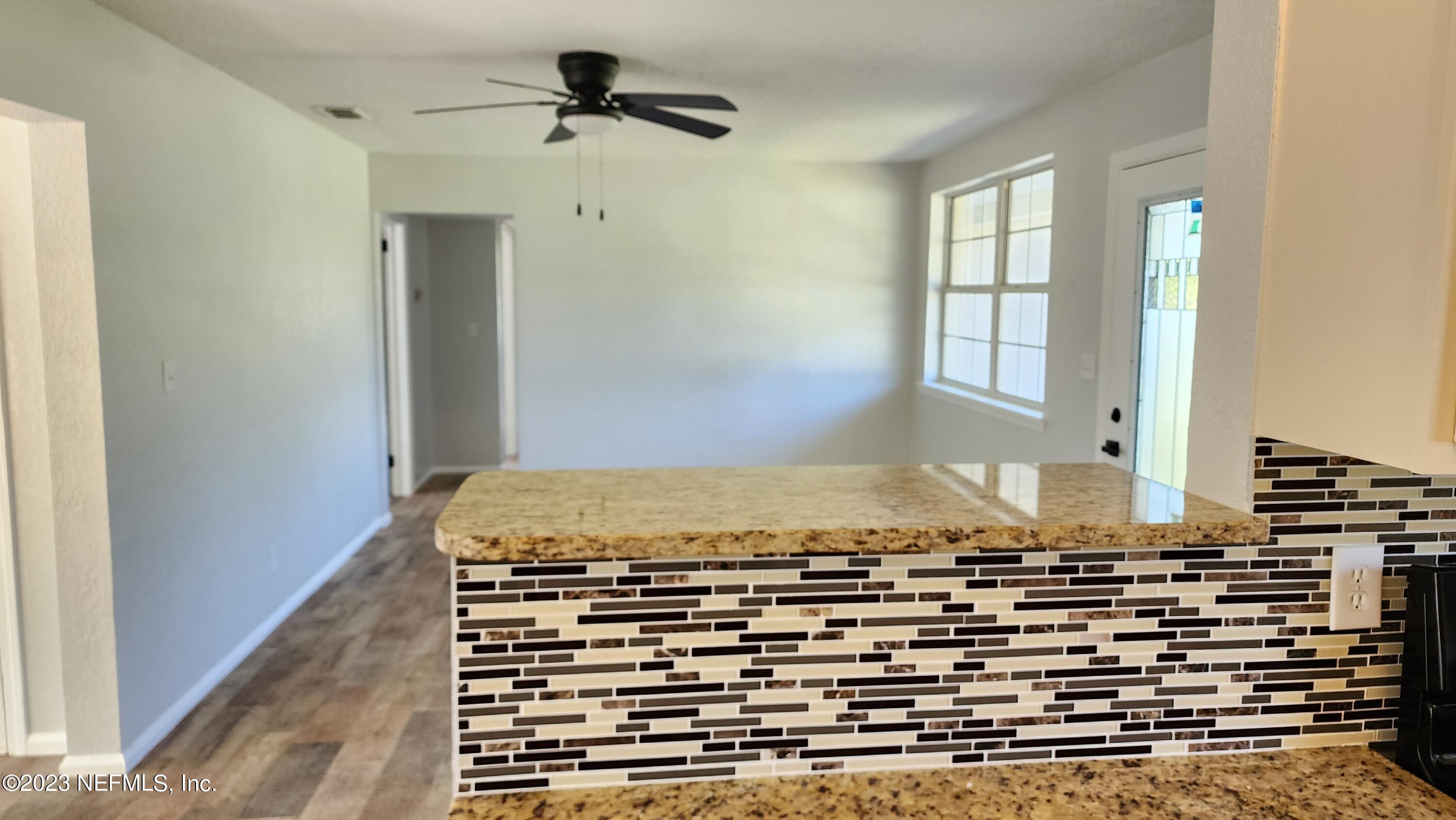 845 Ibis Road Jacksonville, FL 32216 - Photo 11 of 40 Breakfast Bar to Living Room
