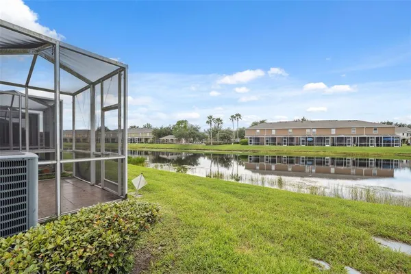 a view of a lake with a building in the background