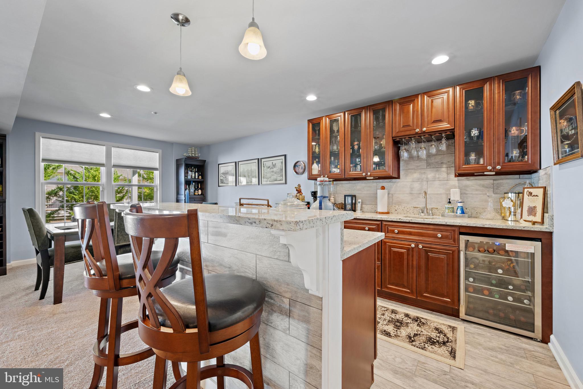 313 Lennox Drive Fallston, MD 21047 - Photo 48 of 66 Indoor wet bar featuring decorative backsplash