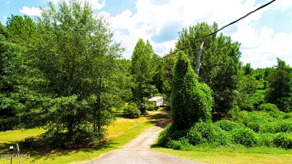 a view of swimming pool with seating area