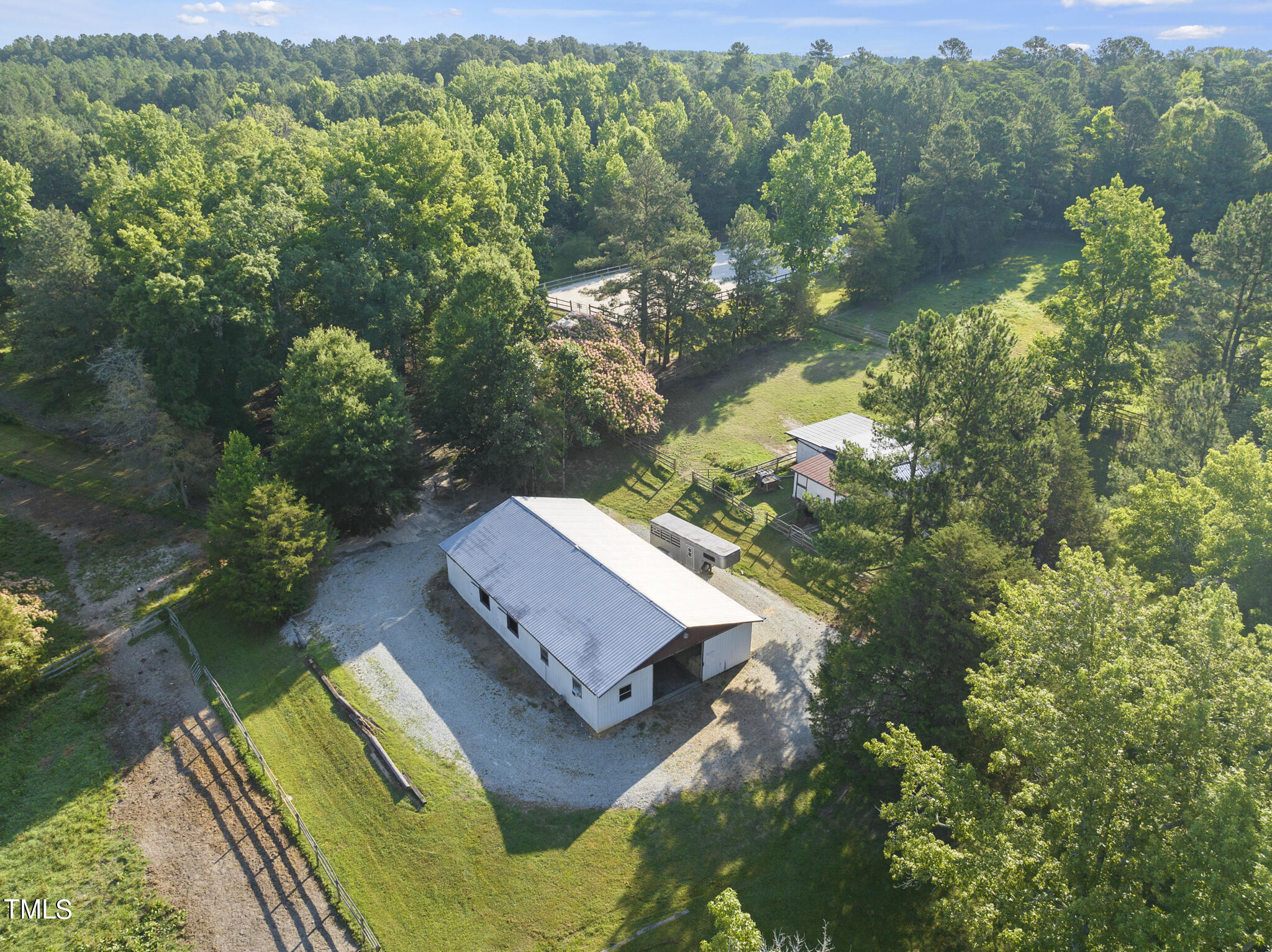 9402 Hampton Road Rougemont, NC 27572 - Photo 27 of 48 an aerial view of a house with a yard