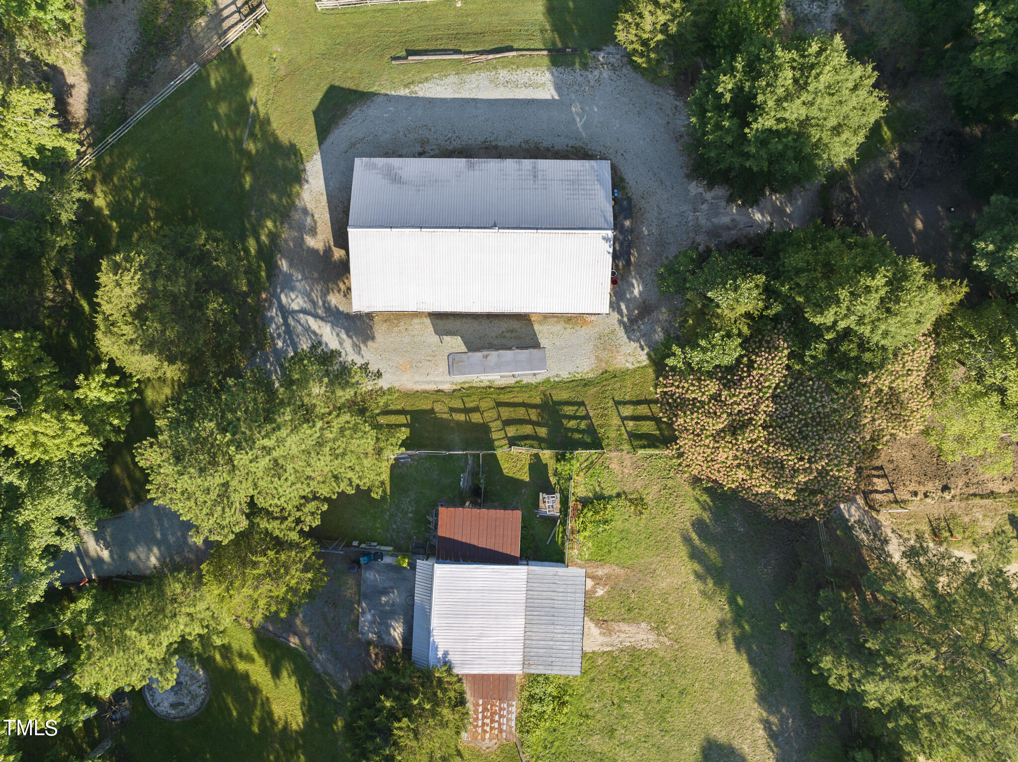 9402 Hampton Road Rougemont, NC 27572 - Photo 29 of 48 an aerial view of a house with a yard