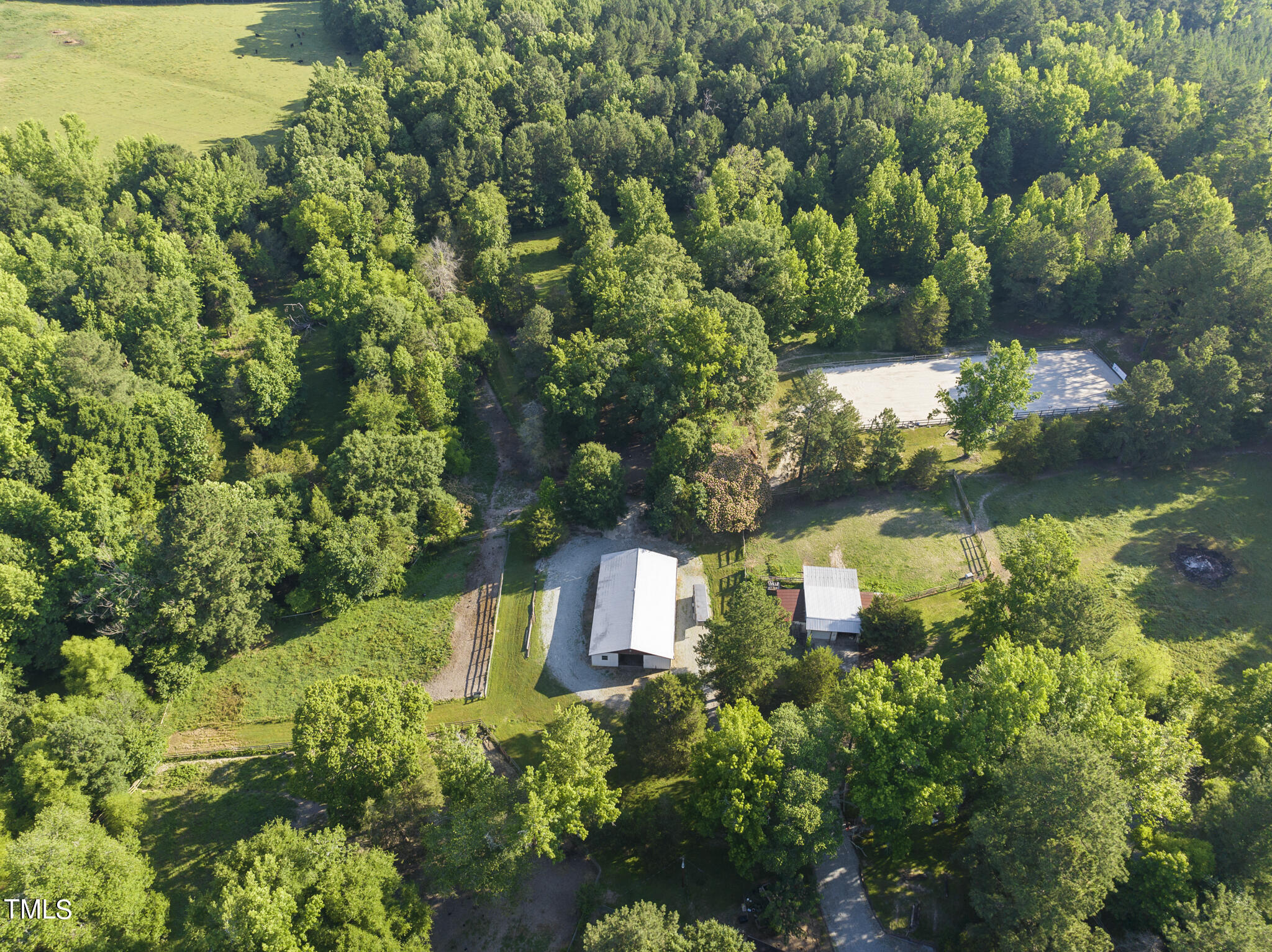9402 Hampton Road Rougemont, NC 27572 - Photo 35 of 48 an aerial view of a house with a yard and lake view