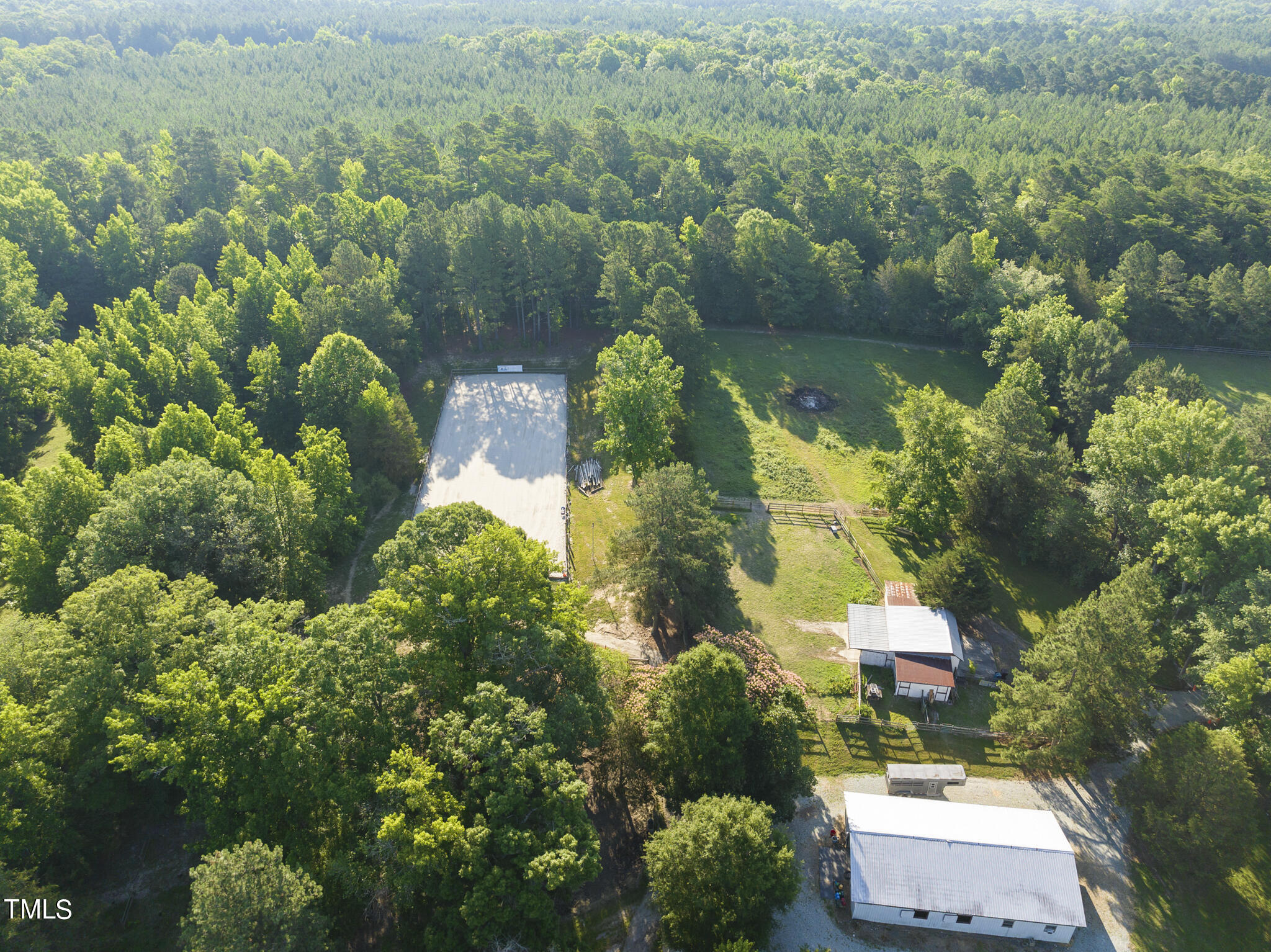 9402 Hampton Road Rougemont, NC 27572 - Photo 44 of 48 an aerial view of residential houses with outdoor space and trees