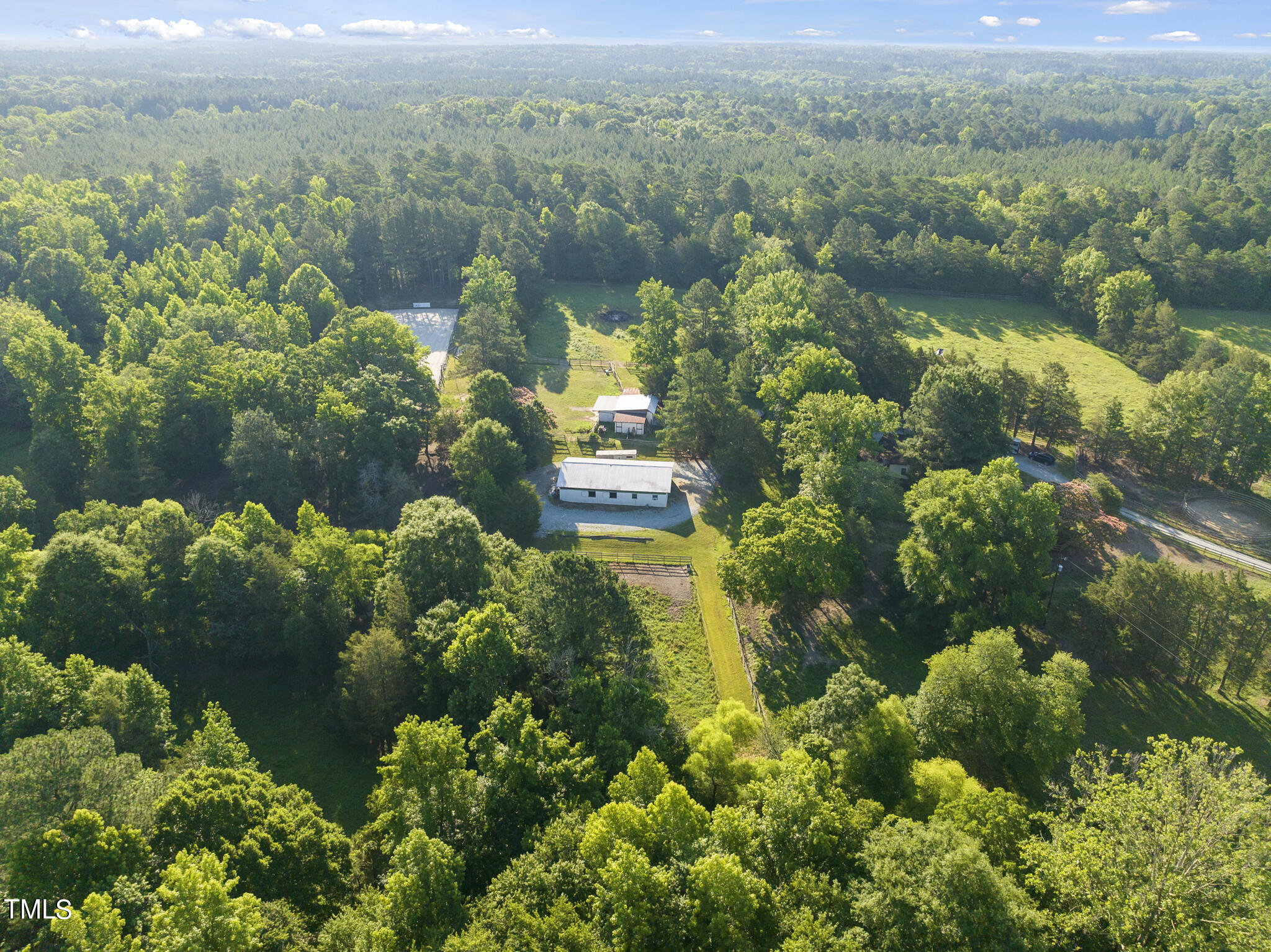 9402 Hampton Road Rougemont, NC 27572 - Photo 45 of 48 a view of a lake with a city