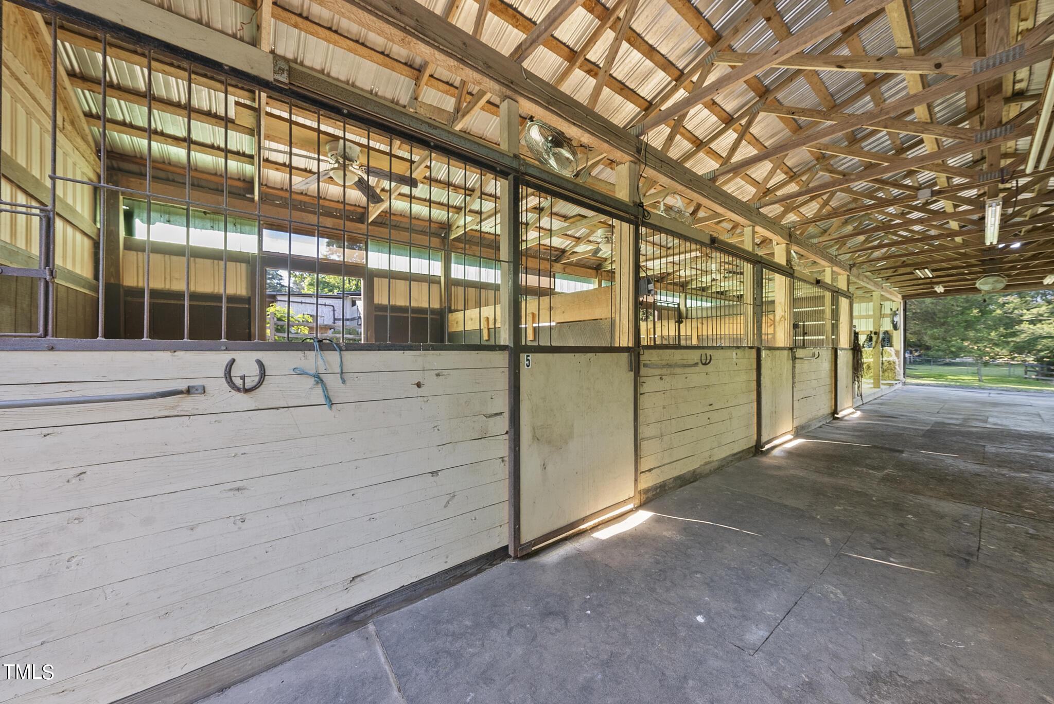 9402 Hampton Road Rougemont, NC 27572 - Photo 5 of 48 a view of parking space with large windows