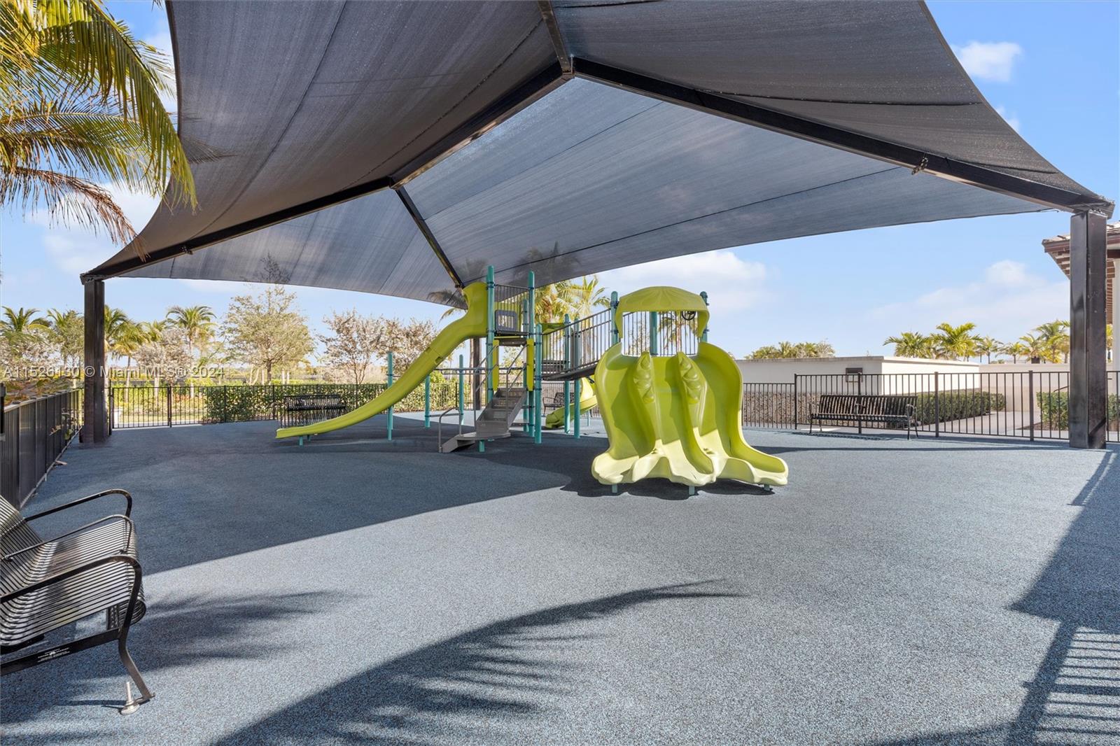 9345 Crestview Circle Palm Beach Gardens, FL 33412 - Photo 25 of 28 a view of a swimming pool with a patio