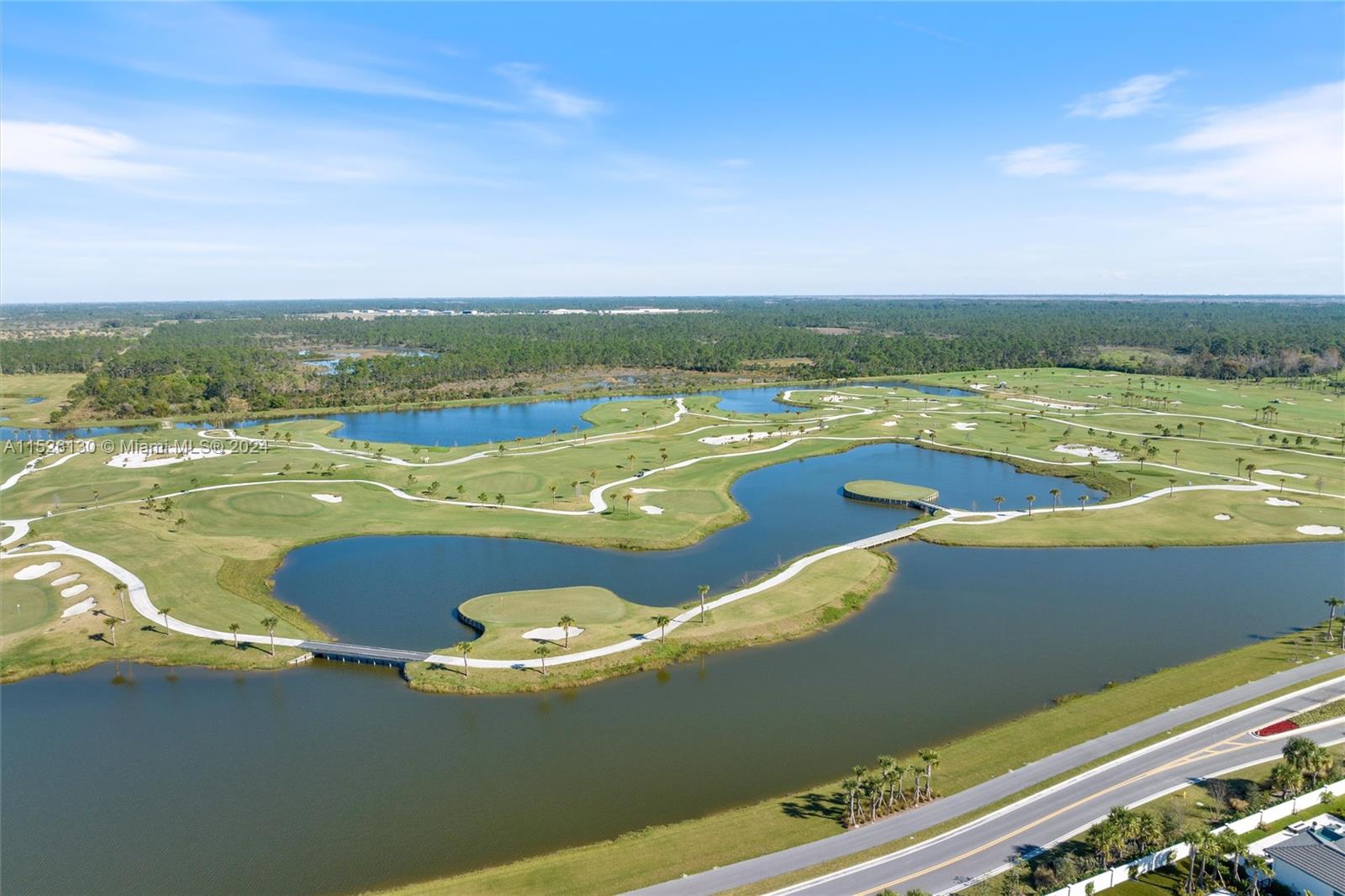 9345 Crestview Circle Palm Beach Gardens, FL 33412 - Photo 28 of 28 a view of a lake with a mountain