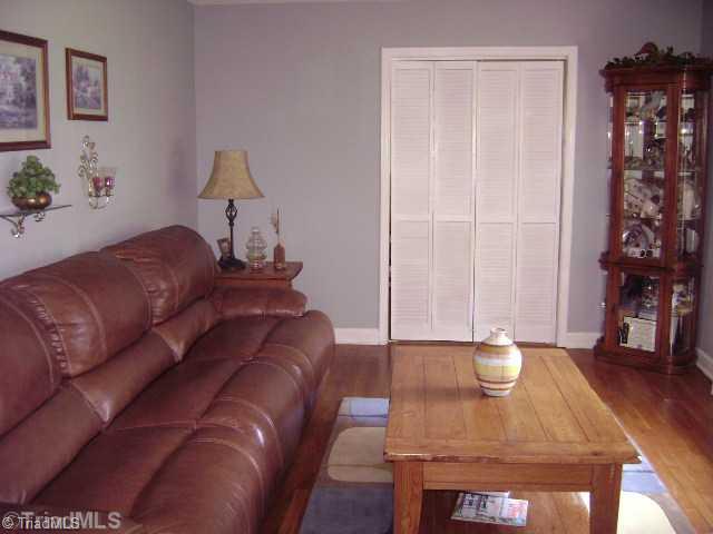1620 Bright Leaf Road Pfafftown, NC 27040 - Photo 2 of 16 Exterior Front. Living room with hardwood flooring.