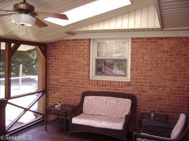 1620 Bright Leaf Road Pfafftown, NC 27040 - Photo 9 of 16 Exterior Front. Screened in porch with sky lights.