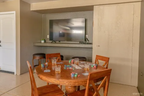 a living room with a couch and a table