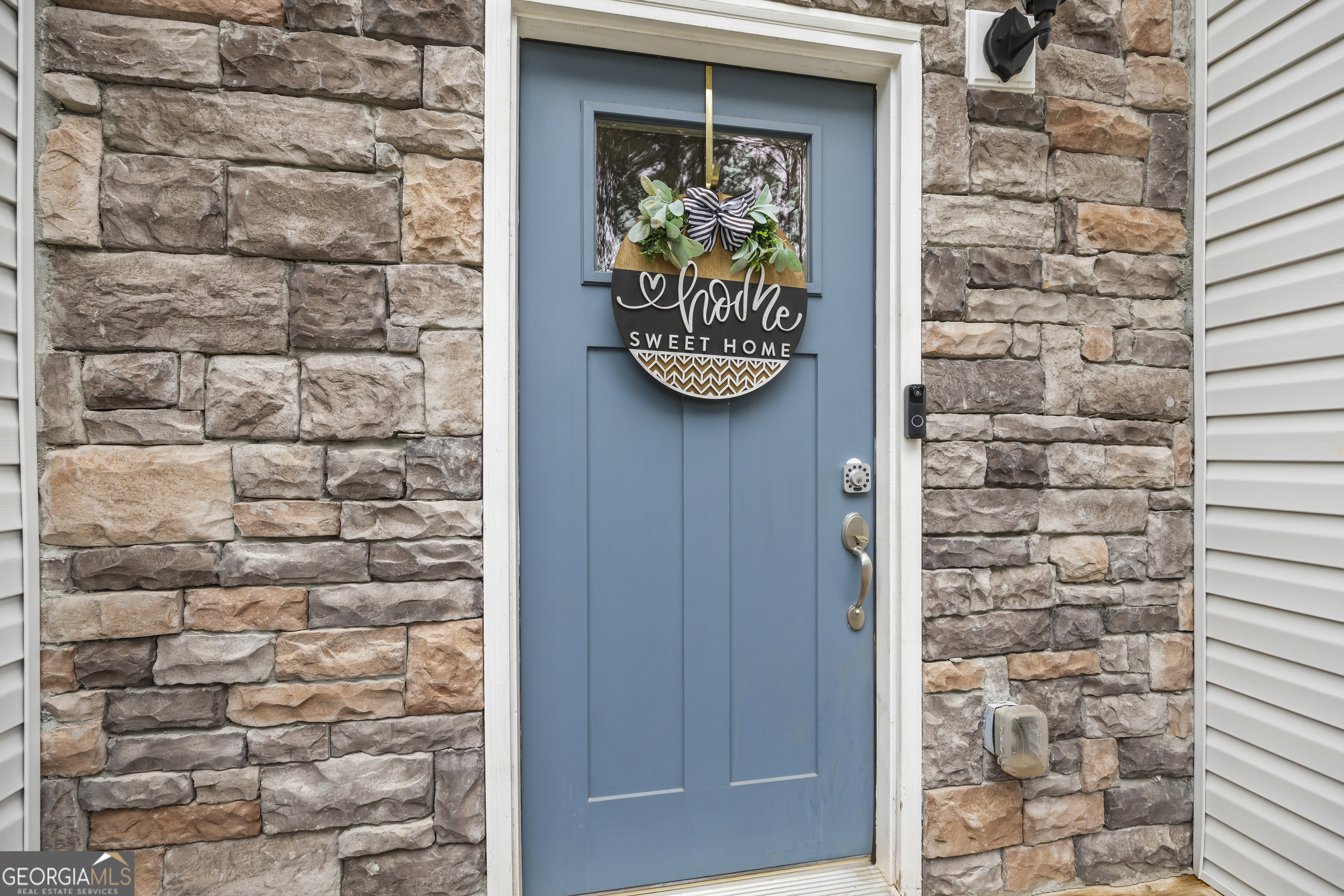 1350 Noah Crow Road Royston, GA 30662 - Photo 14 of 48 a front view of a door with brick walls