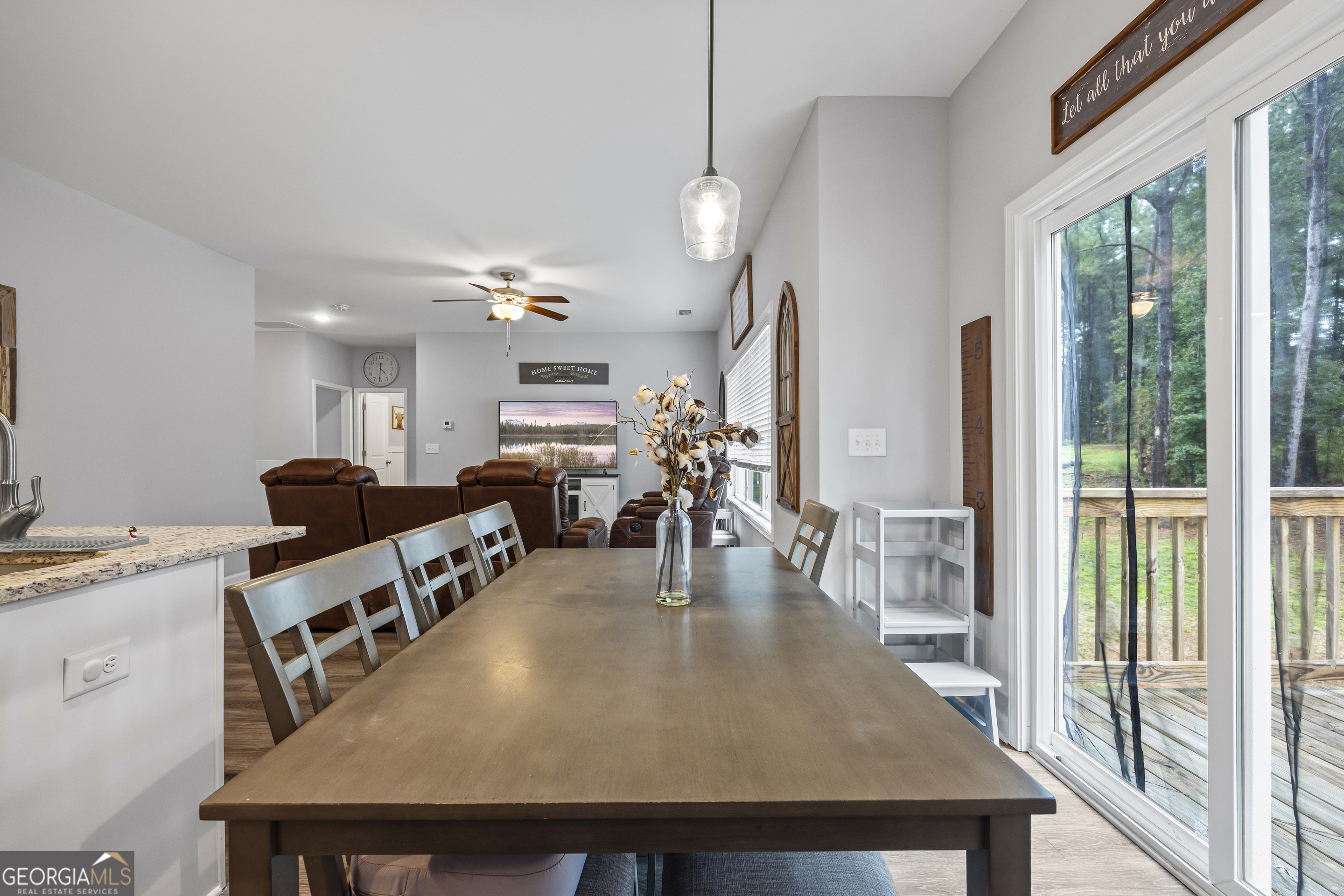 1350 Noah Crow Road Royston, GA 30662 - Photo 25 of 48 a dining room with furniture and wooden floor